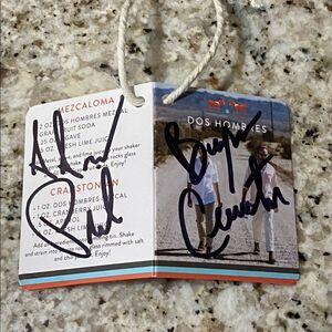 Bryan Cranston & Aaron Paul Breaking Bad Signed Dos Hombres Mezcal Hangtag
